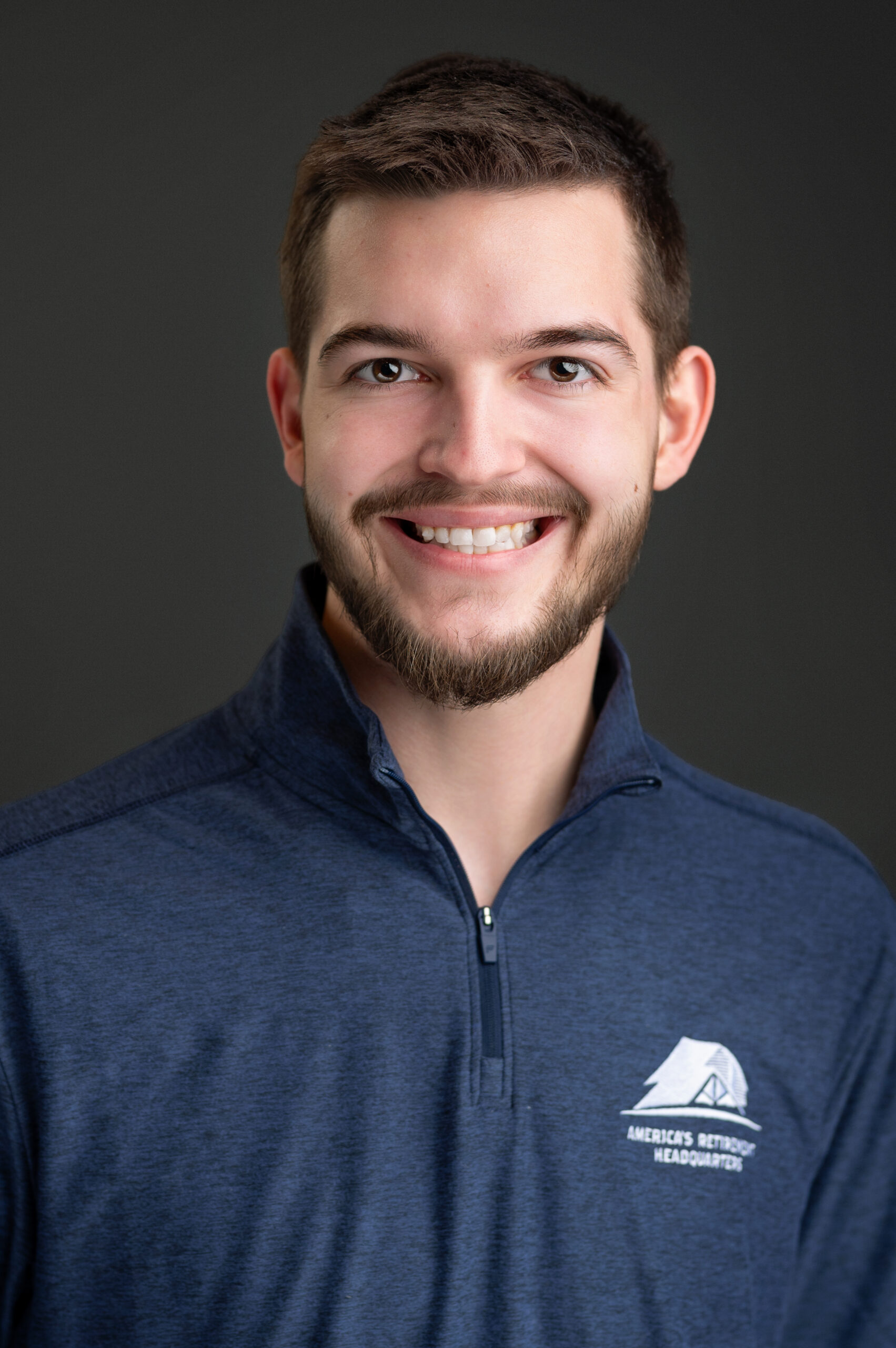 Professional headshot of Andrew Baker, retirement planning expert at ARHQ in Maumee Ohio